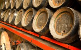 Row of wooden beer barrels